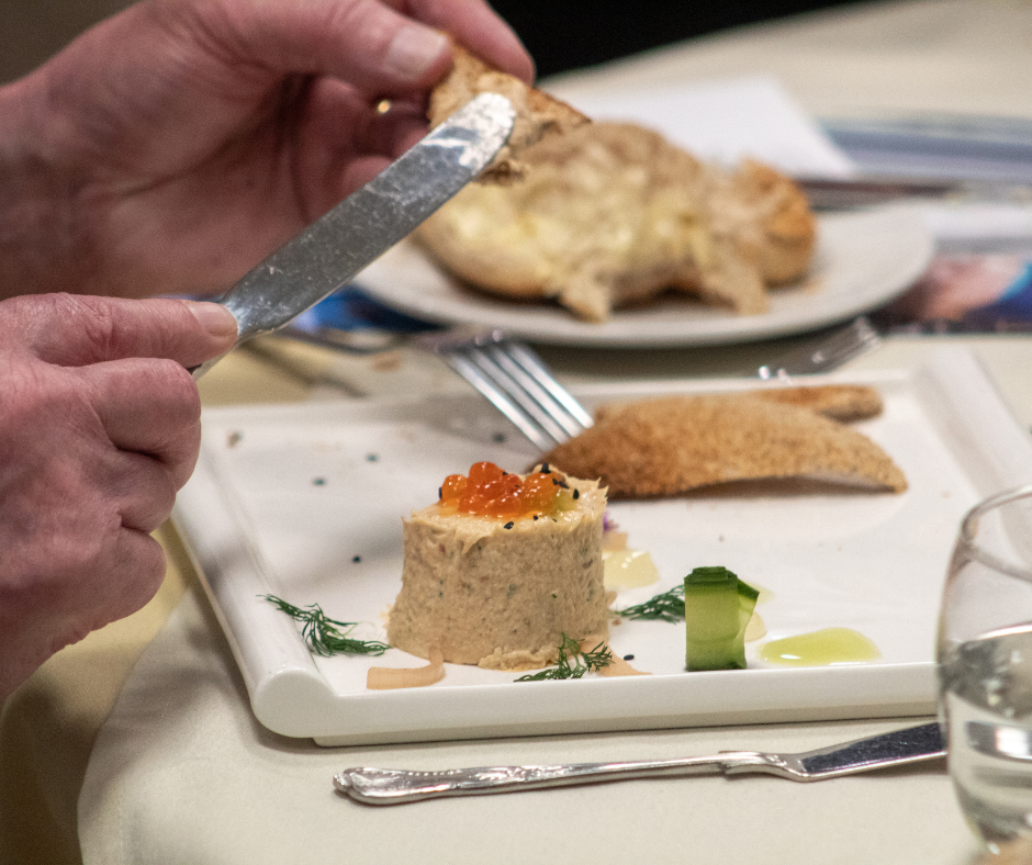Plated seafood dish from NSCOTY 2026 launch dinner.